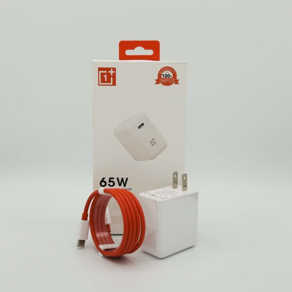 oneplus warp charge 65 power adapter in hand